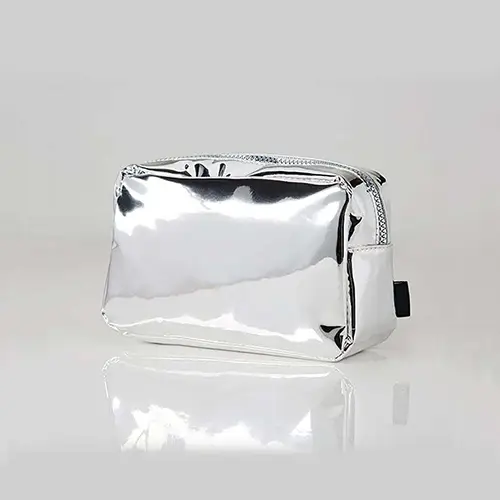 Wholesale Metallic Makeup Bag with Essential Tools | Luxurious Silver Cosmetic Organizer for Beauty Brands & Retailers